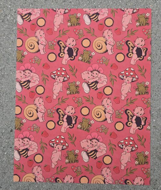 Patterned paper with cartoon characters on a textured surface